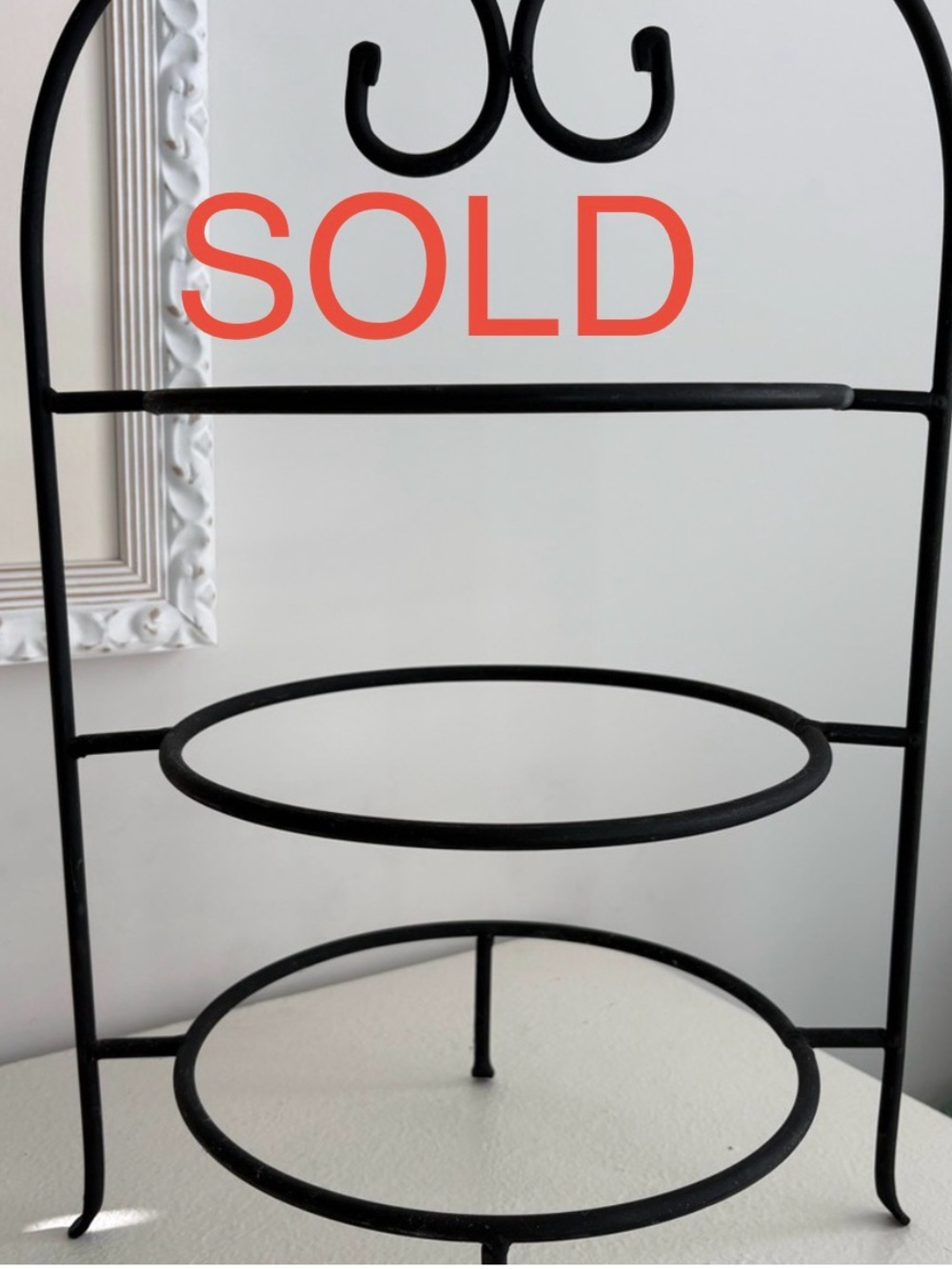 SOLD SOLD SOLD SOLD
Henn Wrought Iron Triple Entertainment Stand.